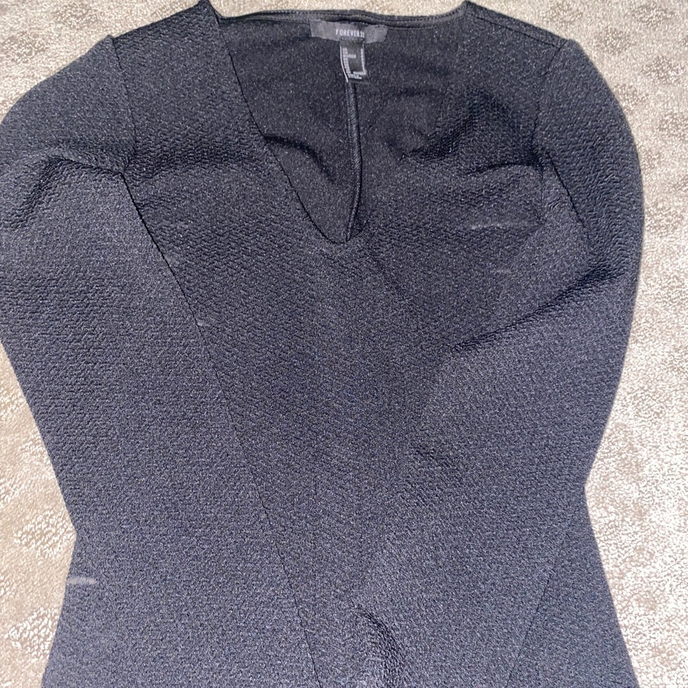 A black v neck long sleeve bodysuit